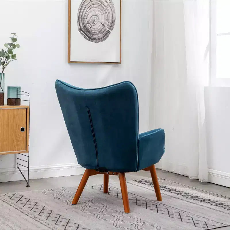 Poltrona accent Leiria in velluto liscio trapuntato con poggiapiedi, blu