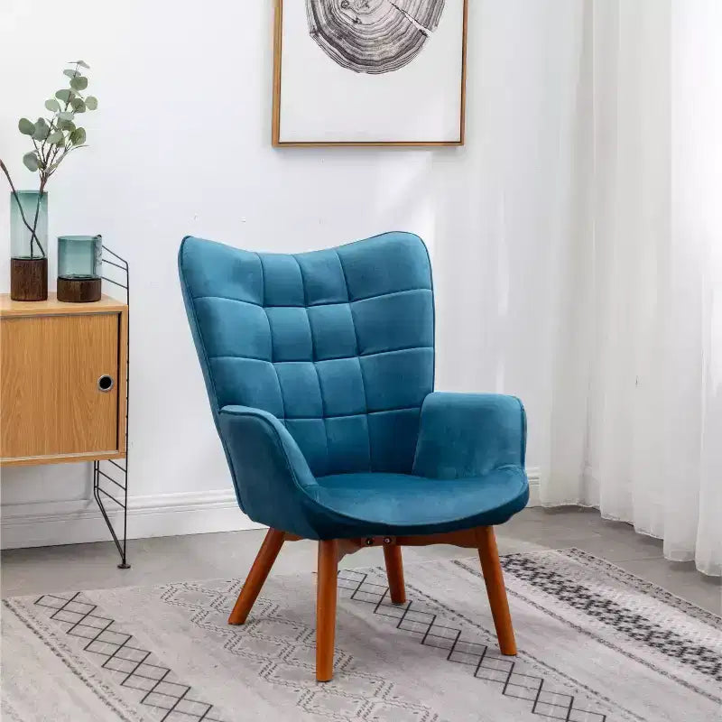 Poltrona accent Leiria in velluto liscio trapuntato con poggiapiedi, blu
